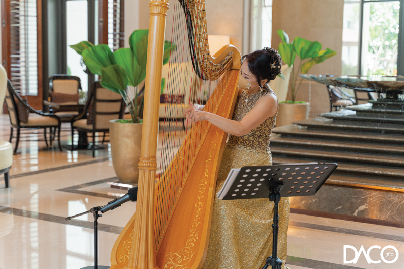 Madam Wang, The Harpist at Siam Kempinski Bangkok